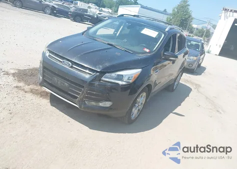 2016 Ford Escape Titanium z USA, uszkodzony, nr VIN 1FMCU9J95GUA72135